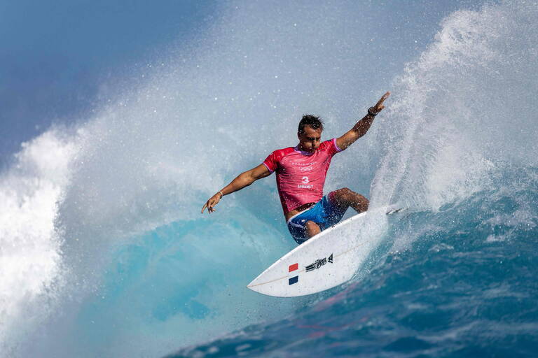 Kauli Vaast of Team France rides a wave during the men's gold medal match of surfing on day nine of the Olympic Games Paris 2024 on August 05, 2024 in Teahupo'o, French Polynesia. (Photo by Ed Sloane / POOL / AFP)